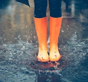 Rain boots in the water.