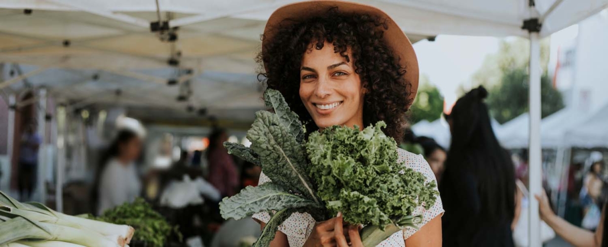 Woman shopping at Cannon Beach Farmers Market